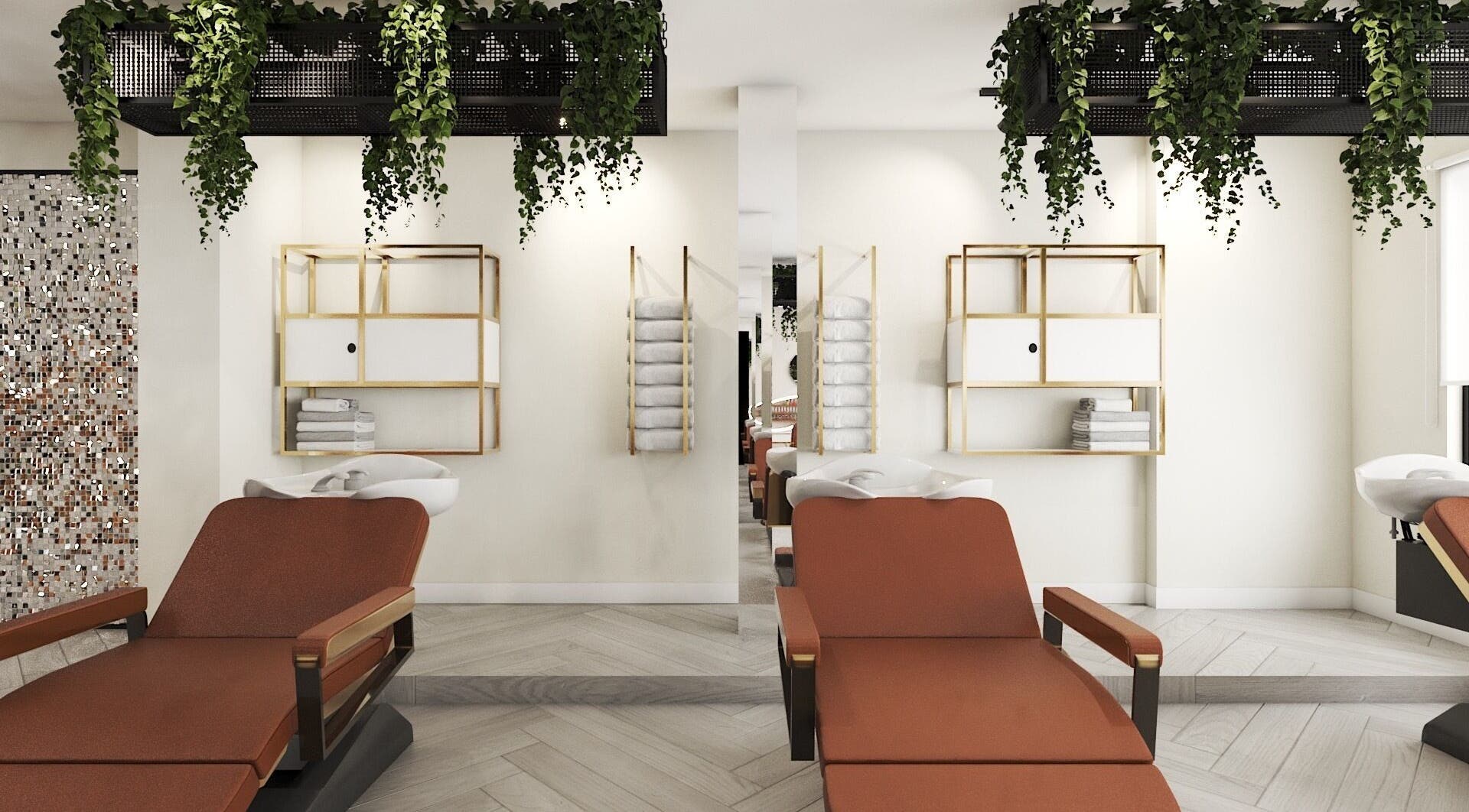 Elegant salon interior at Leena Hari, Colombo, Western Province, LK, featuring stylish chairs and greenery.