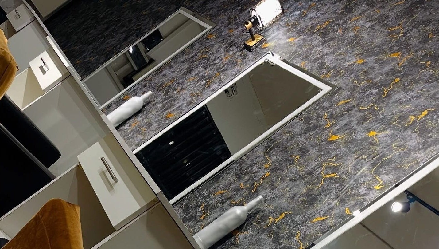 Luxurious vanity setup at Exquisite Pulchritude, Lusaka, Lusaka Province, ZM, with chic marble design.