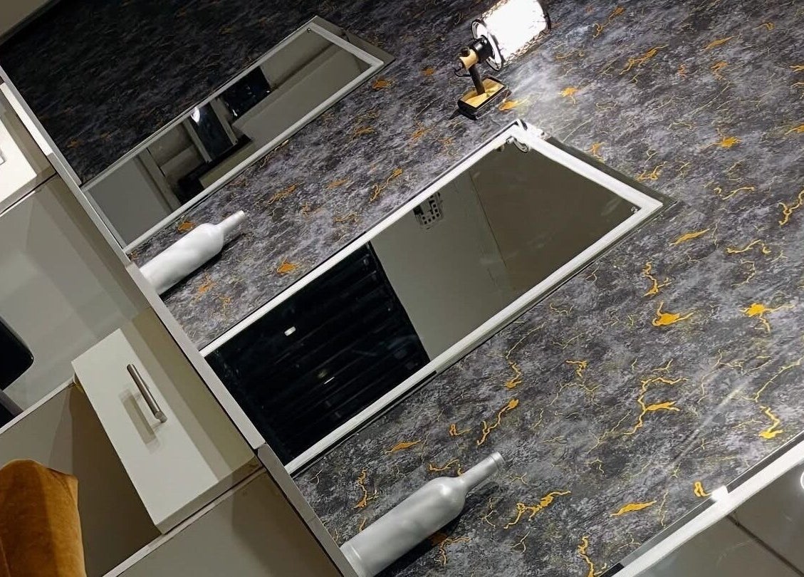 Luxurious vanity setup at Exquisite Pulchritude, Lusaka, Lusaka Province, ZM, with chic marble design.