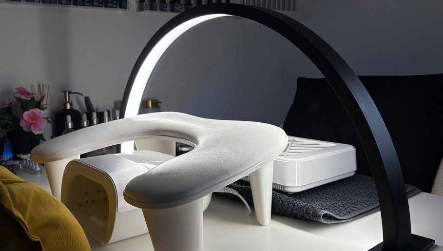 Modern manicure setup at Ellsbeautymark, Aveley, England, GB, featuring sleek and stylish equipment.