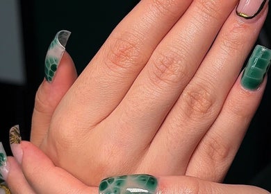 Stylish green acrylic nails designed by Ellsbeautymark in Aveley, England, GB. Perfect for any occasion.