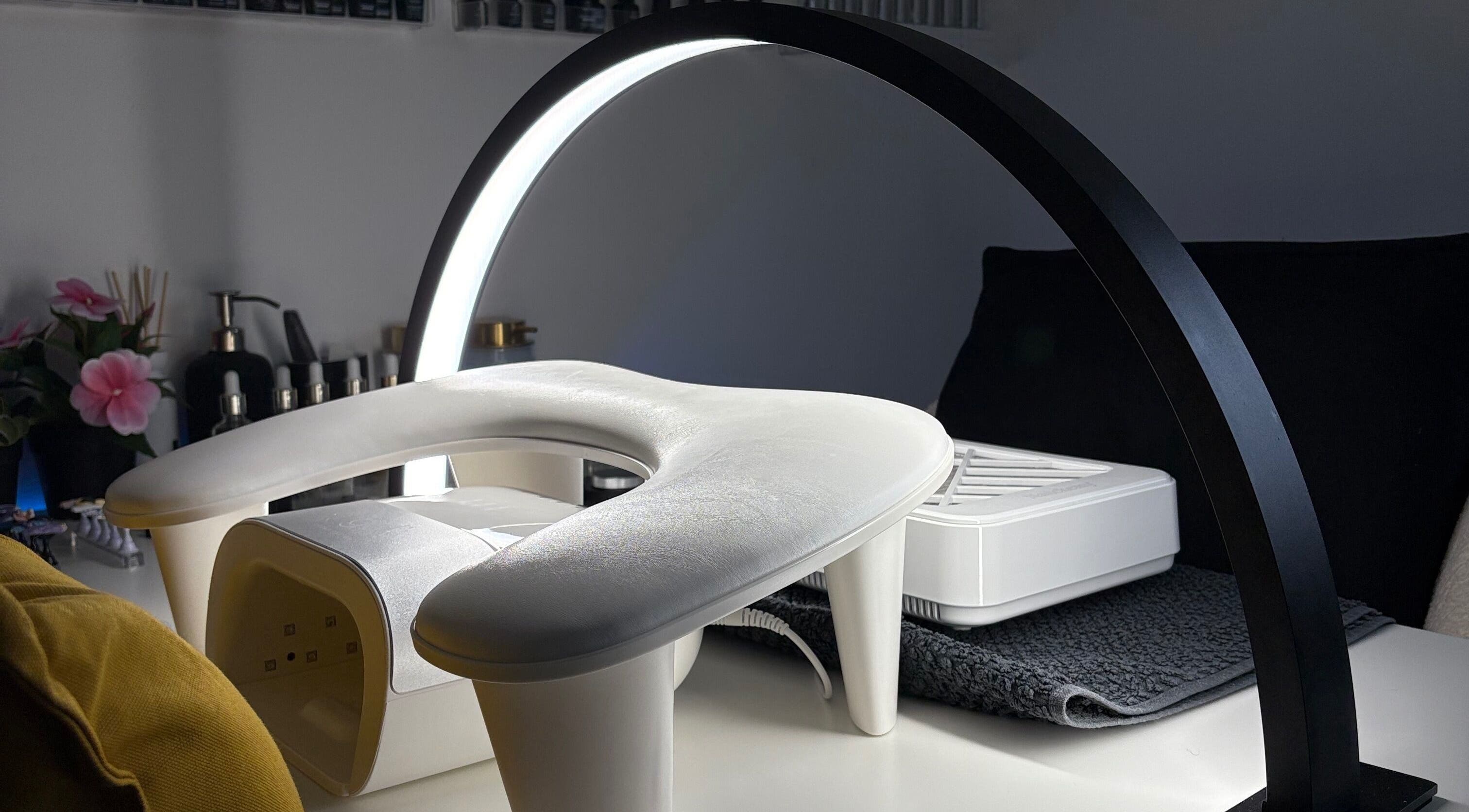 Modern nail treatment station at Ellsbeautymark, Aveley, England, GB, featuring elegant lighting and decor.