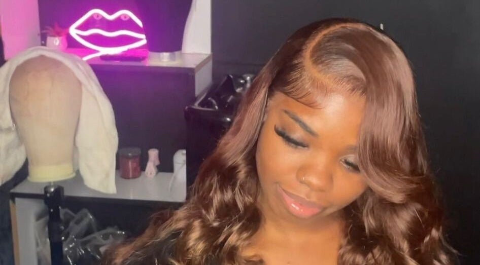 Stylish hair design at Pure Glow Beauty Lodge in Nassau, New Providence, BS, showcasing vibrant beauty.