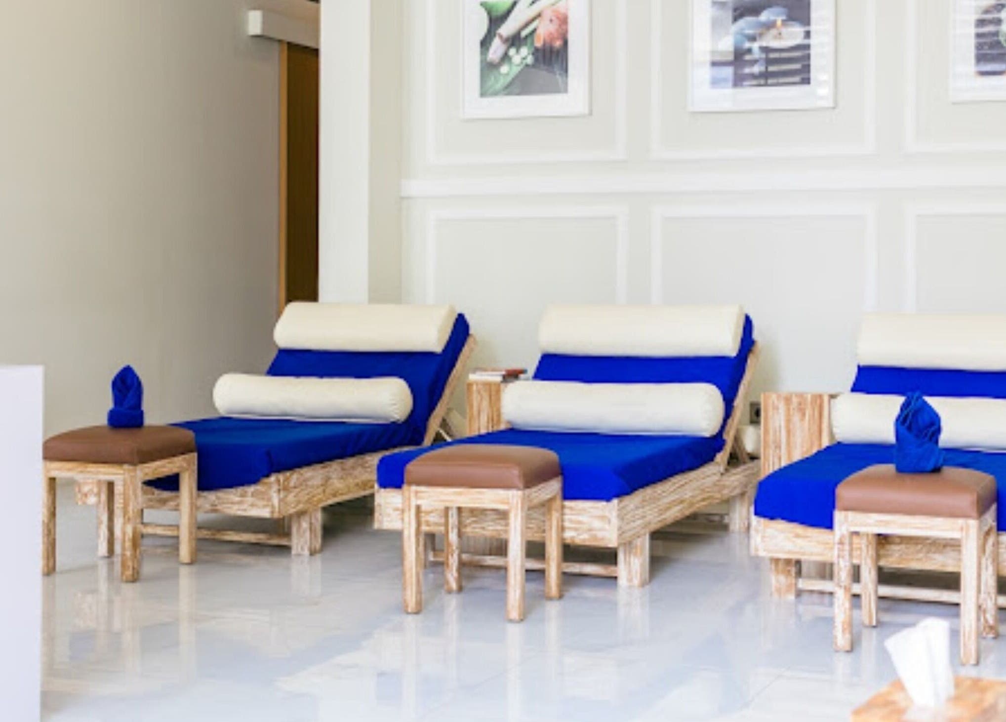 Relaxation area at Amaya Wellness and Spa, Denpasar, Bali, ID with comfortable loungers and decor.