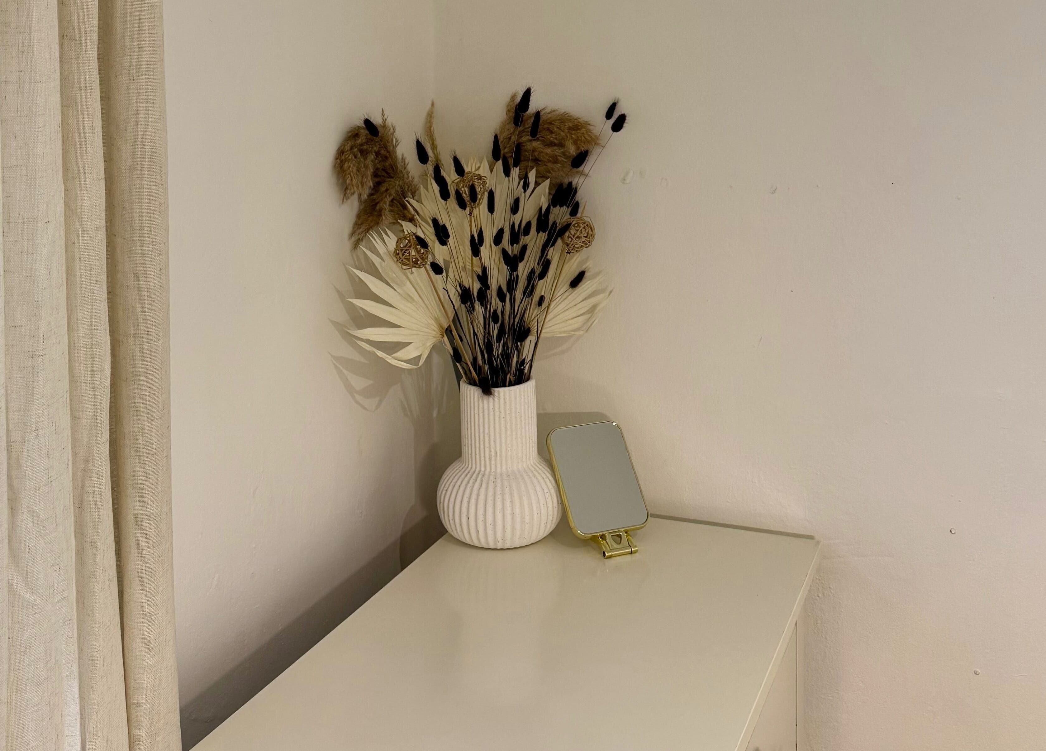 Elegant dried flower arrangement in vase at Rare Aesthetics UK, Brighton And Hove, GB.