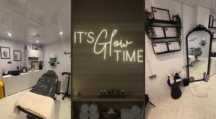 Interior of Redefined Aesthetics & Skin in Bargoed, Wales, GB showcasing cozy treatment area and decor.