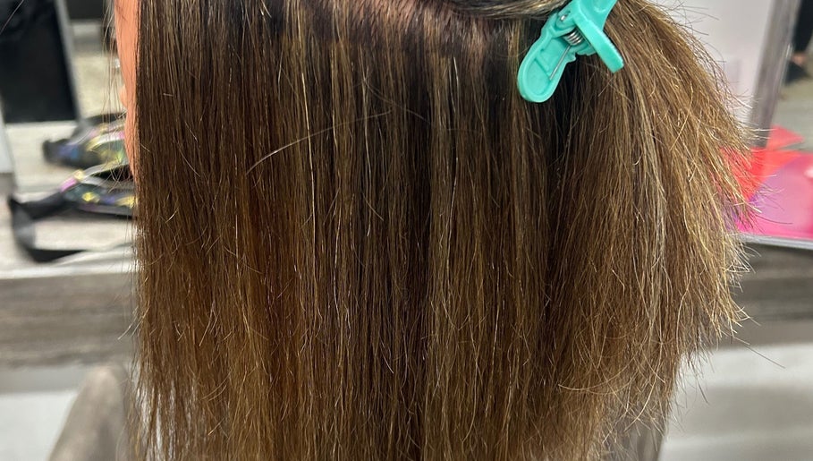 Close-up of sleek hair styling at Georgia Lou Hair, Dewsbury, England, GB.