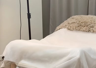 Cozy treatment bed at Madara Z Beauty/Brows by Madara Centrs in Rīga, LV, with plush blanket and soothing ambiance.