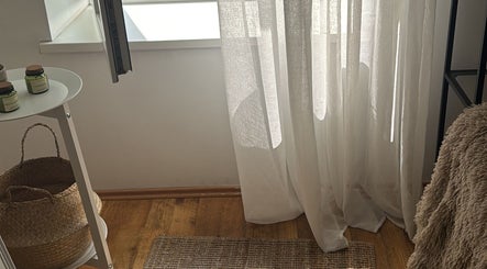 Cozy corner with candles at Madara Z Beauty, Rīga, LV.