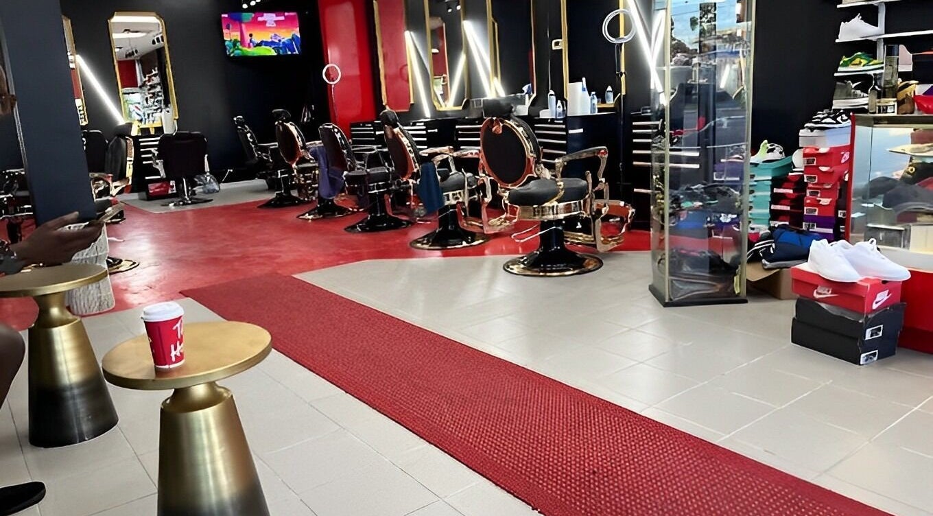 Chic interior of T&K Barbier(Barbershop) in Montréal, with stylish barber chairs and modern decor.