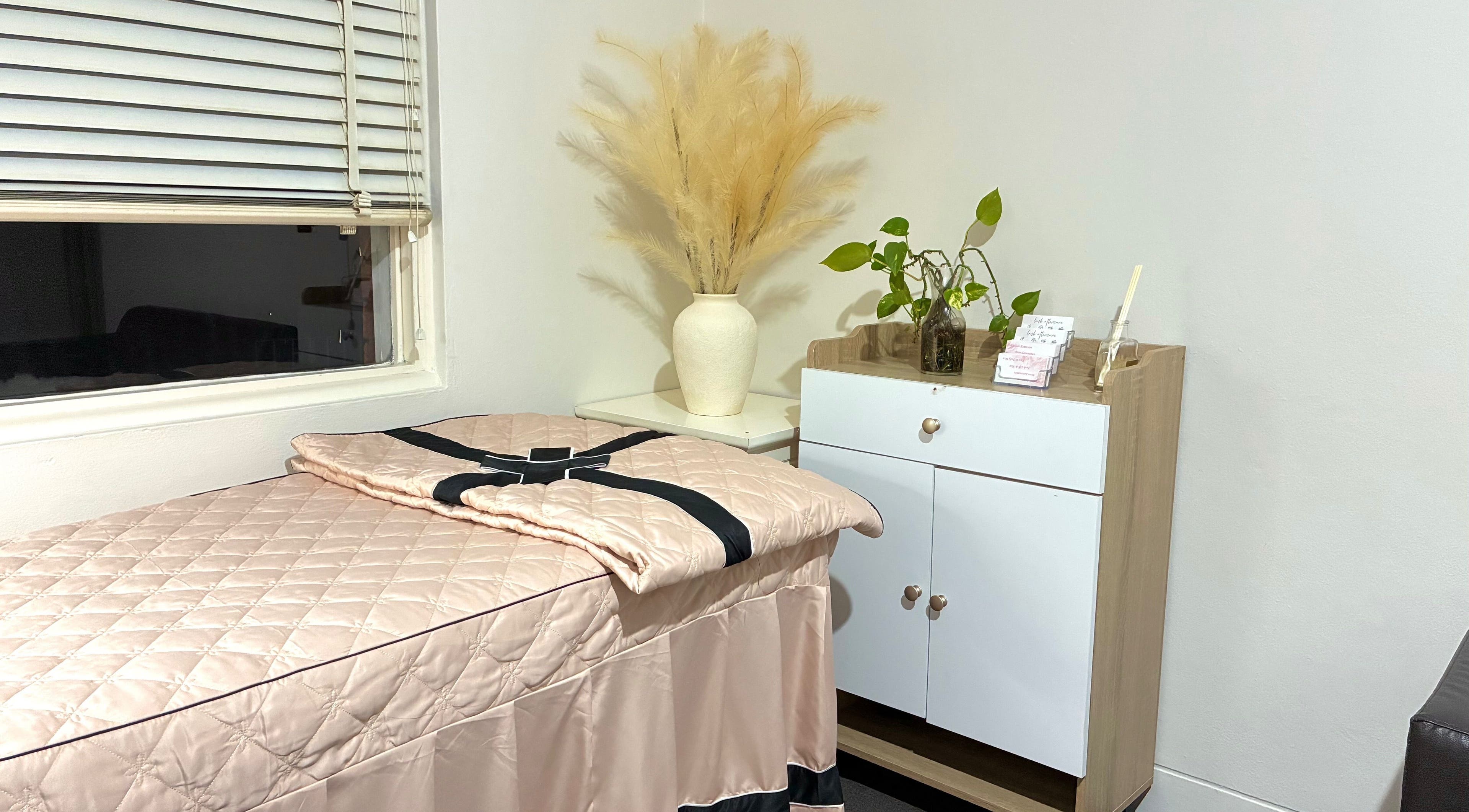 Sweety Lashes tranquil room with massage bed and decor in Campsie, New South Wales, AU.
