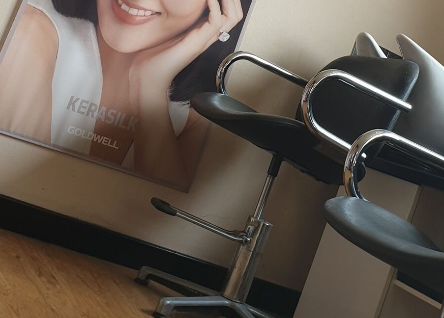 Interior of Panache Hair and Beauty Salon in Battle, England featuring stylish chairs and decor.