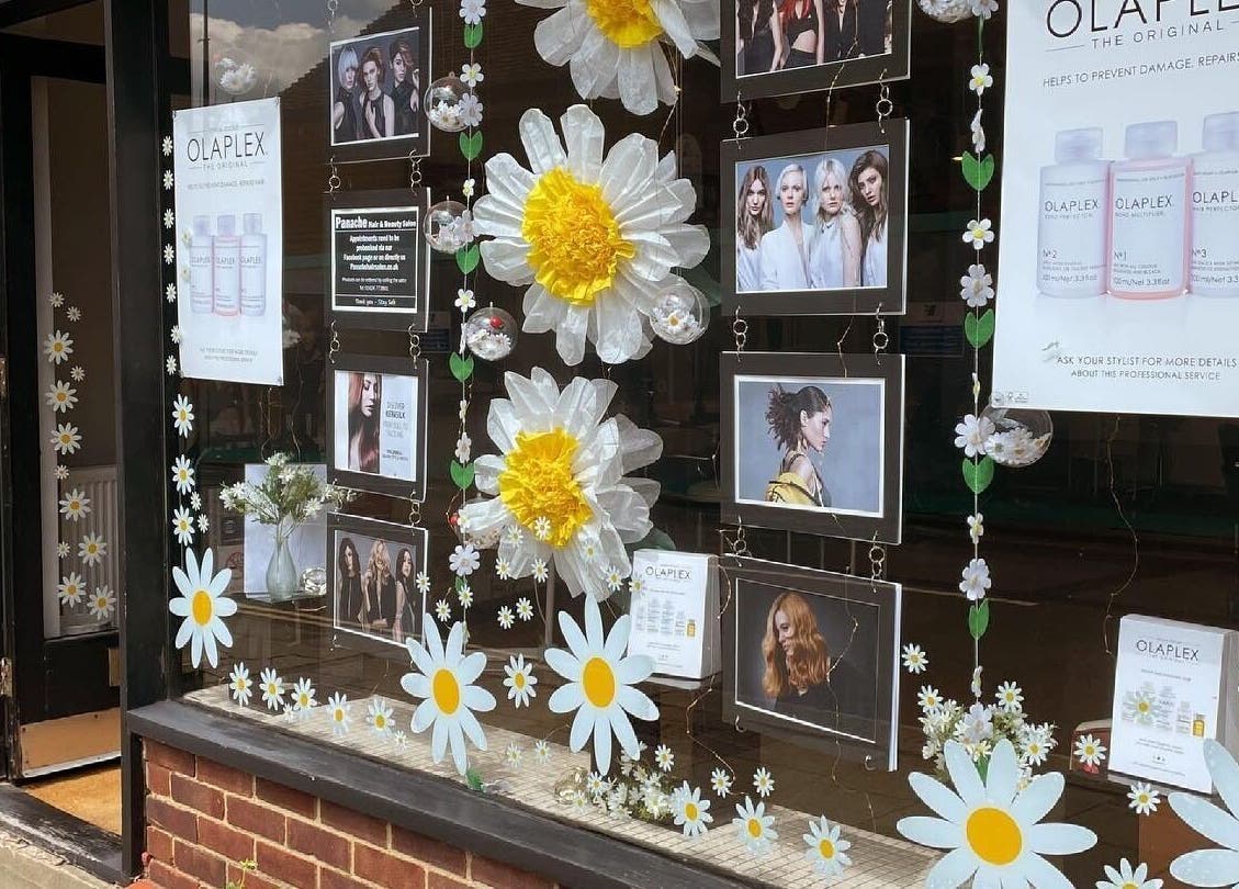 Charming window display at Panache Hair and Beauty Salon, Battle, England, GB, featuring floral decorations.