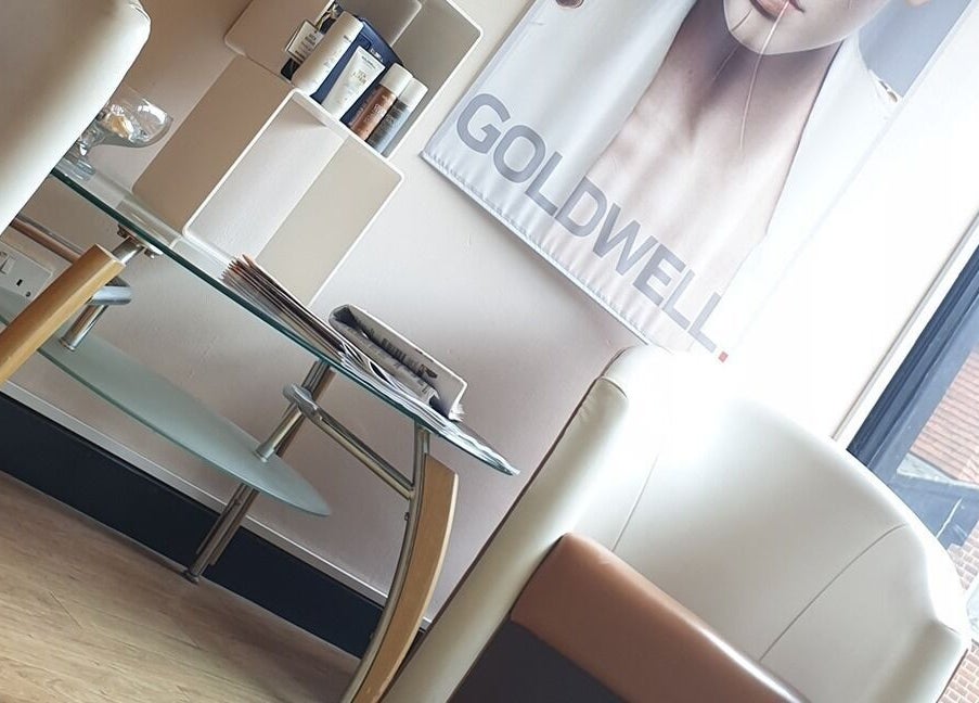 Panache Hair and Beauty Salon in Battle, England, GB features modern seating and Goldwell products.