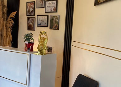 Stylish reception at Ana's Nails Studio, Paramaribo, SR with elegant decor and artful details.