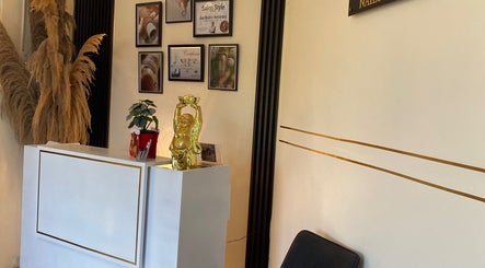 Stylish reception at Ana's Nails Studio, Paramaribo, SR with elegant decor and artful details.