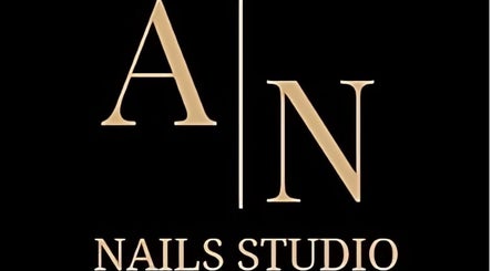 Elegant golden monogram logo of Ana’s Nails Studio, located in Paramaribo, Paramaribo, SR.