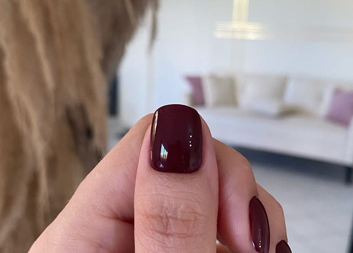 Closeup of deep burgundy nails at Ana’s Nails Studio, Paramaribo, Paramaribo, SR showcasing elegant design.