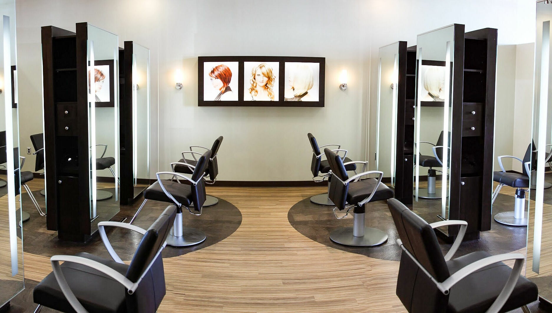 Modern salon chairs at Kathy Adams Salon in Buford, Georgia, US, with stylish mirrors and design.