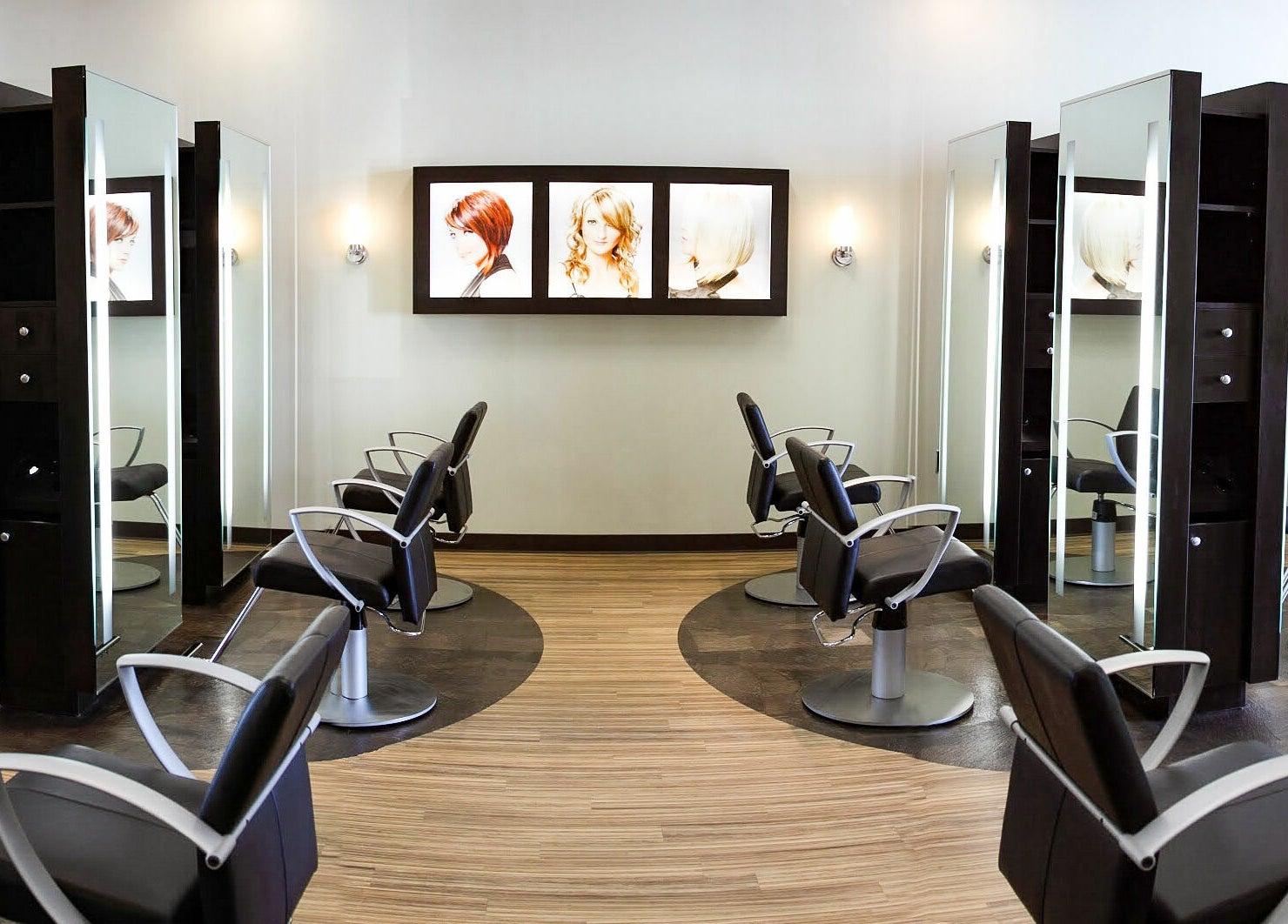 Modern salon chairs at Kathy Adams Salon in Buford, Georgia, US, with stylish mirrors and design.