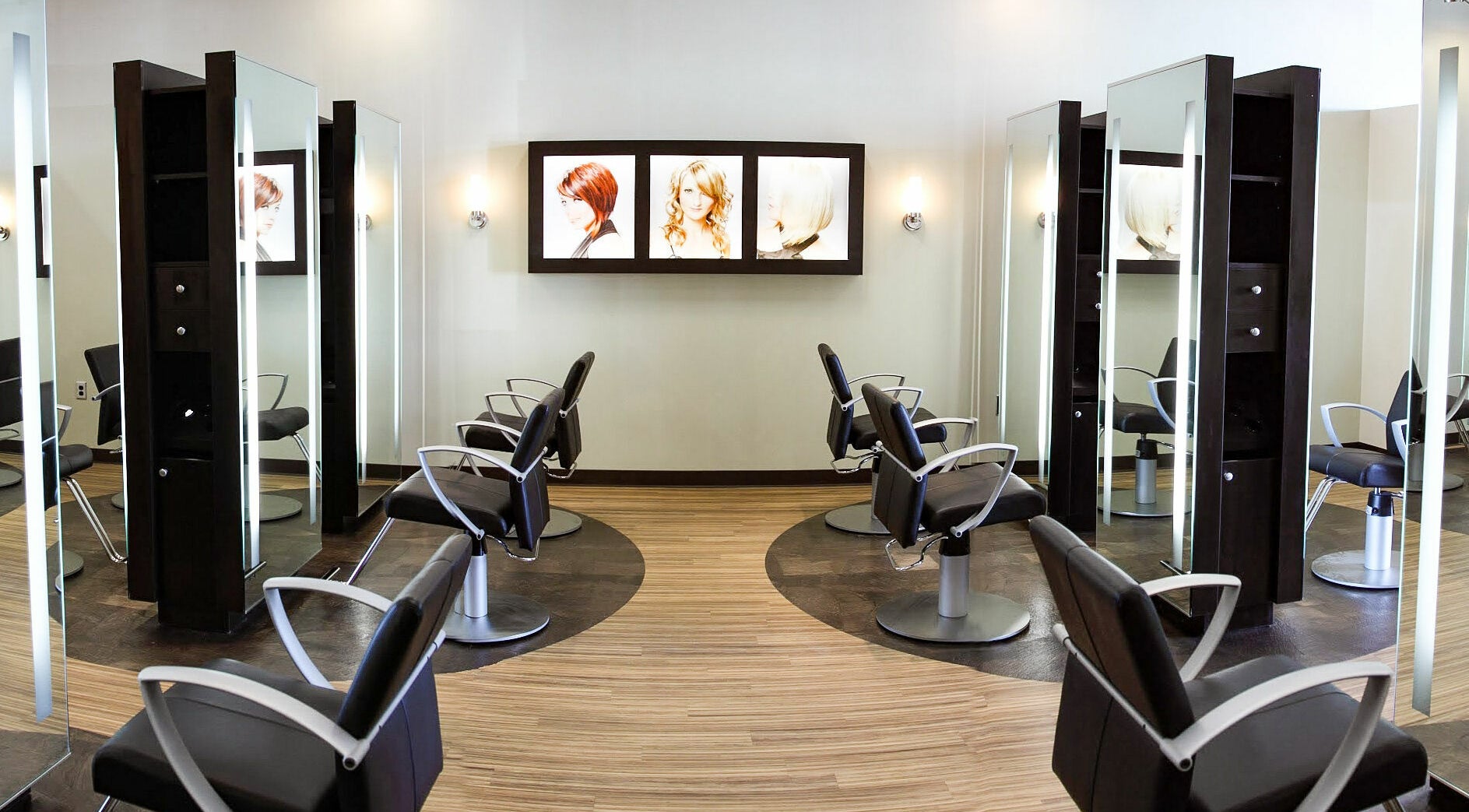 Modern salon chairs at Kathy Adams Salon in Buford, Georgia, US, with stylish mirrors and design.
