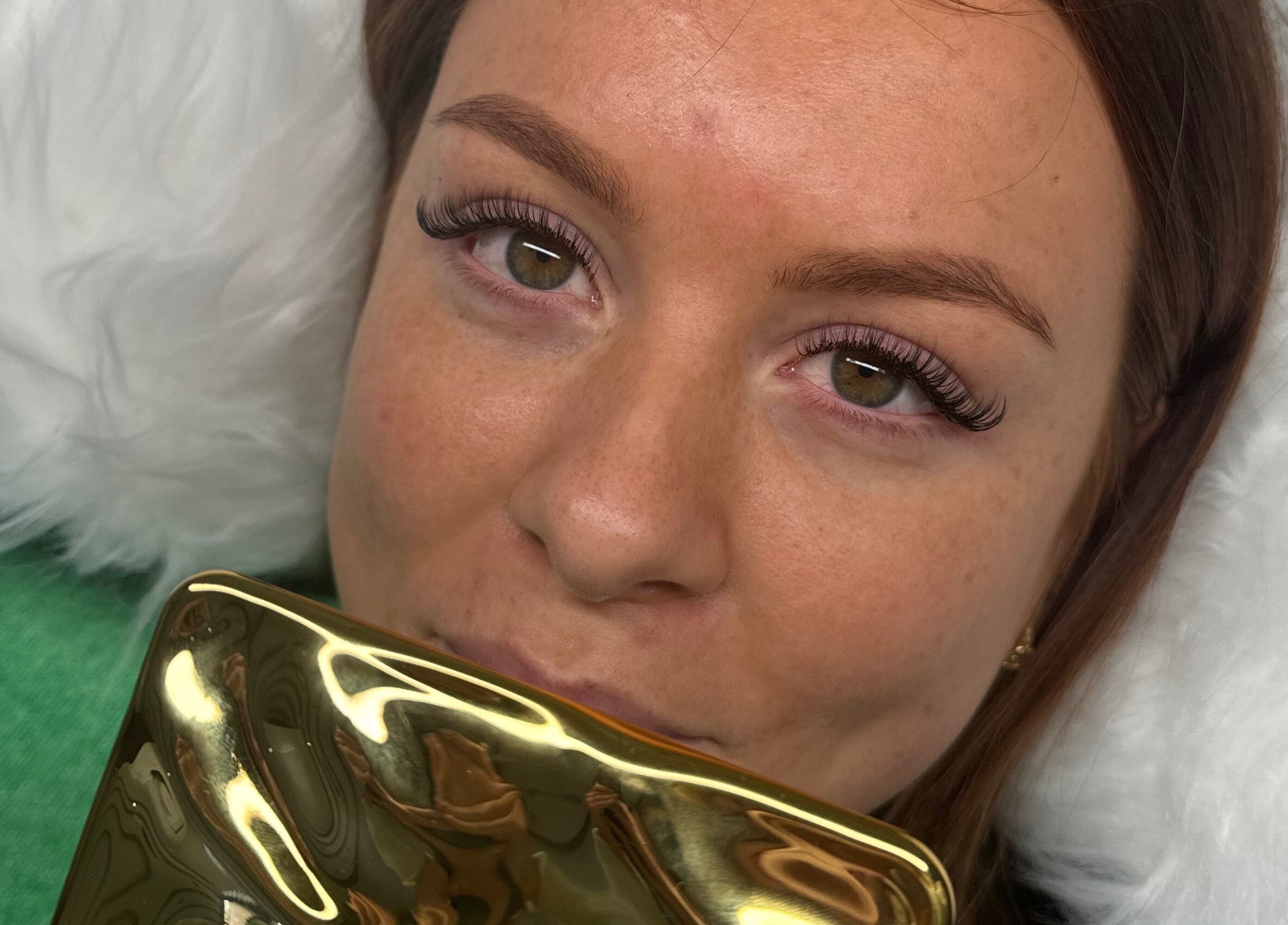 Woman with elegant lashes at Luxe Lash by DK, Newcastle upon Tyne, England, GB.