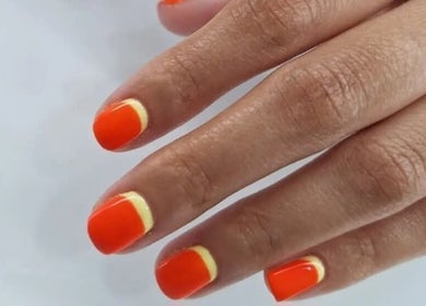 Bright orange and yellow nail art at The Beauty Bar, Carapo, Tunapuna/piarco Regional Corporation, TT.
