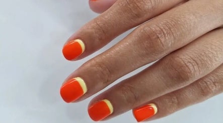 Bright orange and yellow nail art at The Beauty Bar, Carapo, Tunapuna/piarco Regional Corporation, TT.