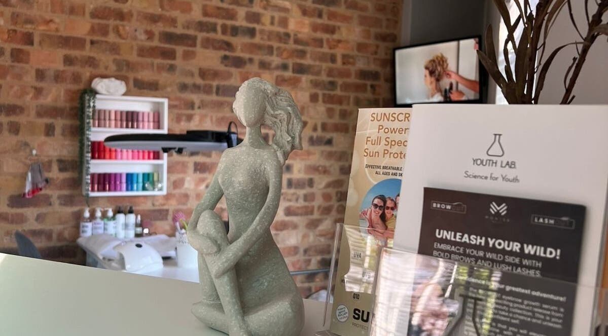 Decorative sculpture in reception at Daysha Aesthetics, Benoni, Gauteng, ZA with nail polish on display.