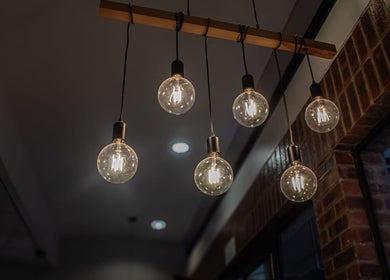 Elegant hanging lights at Christea Makeup Madonna, Wellington, Western Cape, ZA create a cozy ambiance.