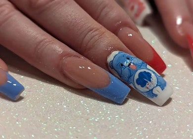 Creative blue and red cartoon nail art design at J.m.nails, Fair Oak, England, GB.