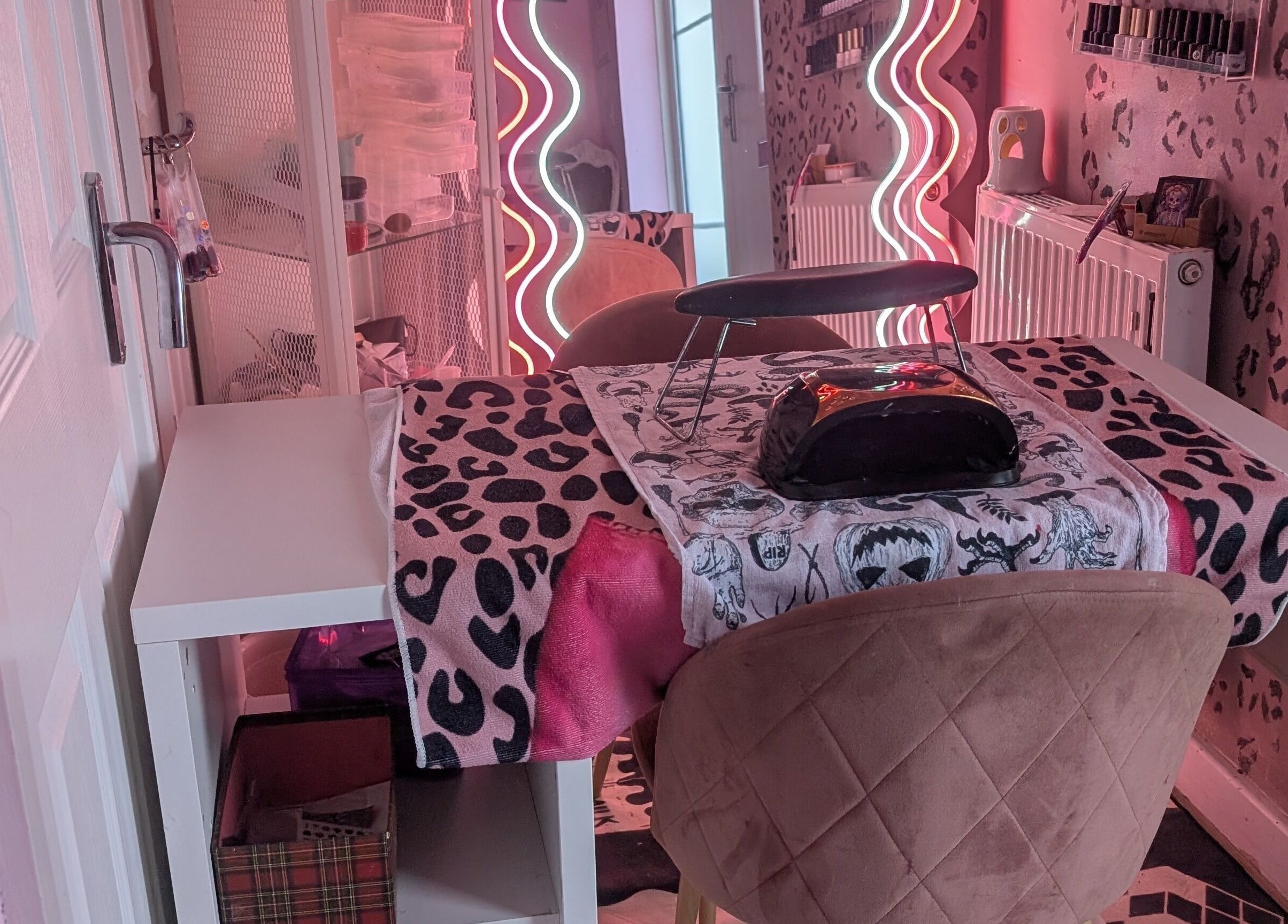 Chic nail station at J.m.nails in Fair Oak, England, GB with stylish decor and vibrant lighting.