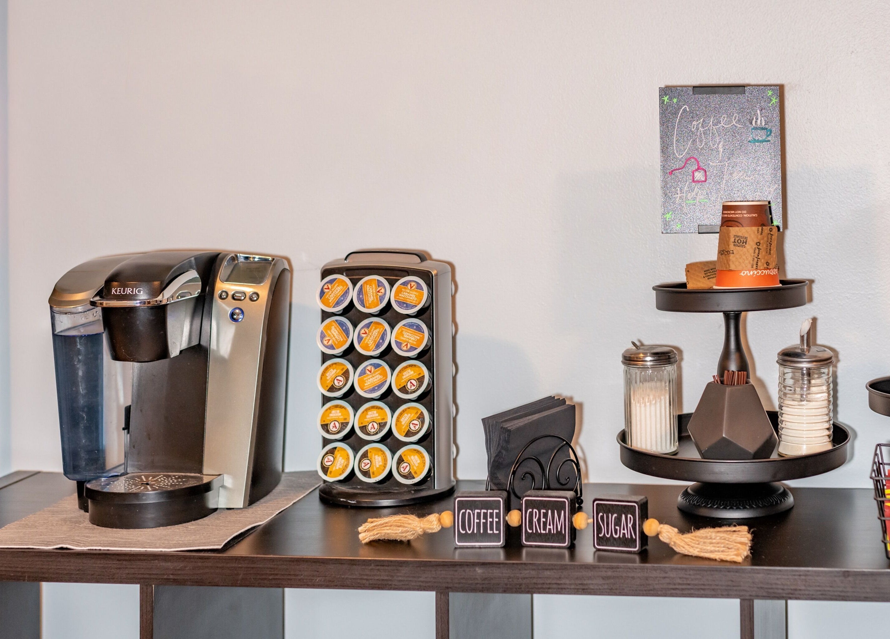 Coffee station at Absolute Body Waxing and Spa, Winter Park, Florida, US, offering a warm welcome.