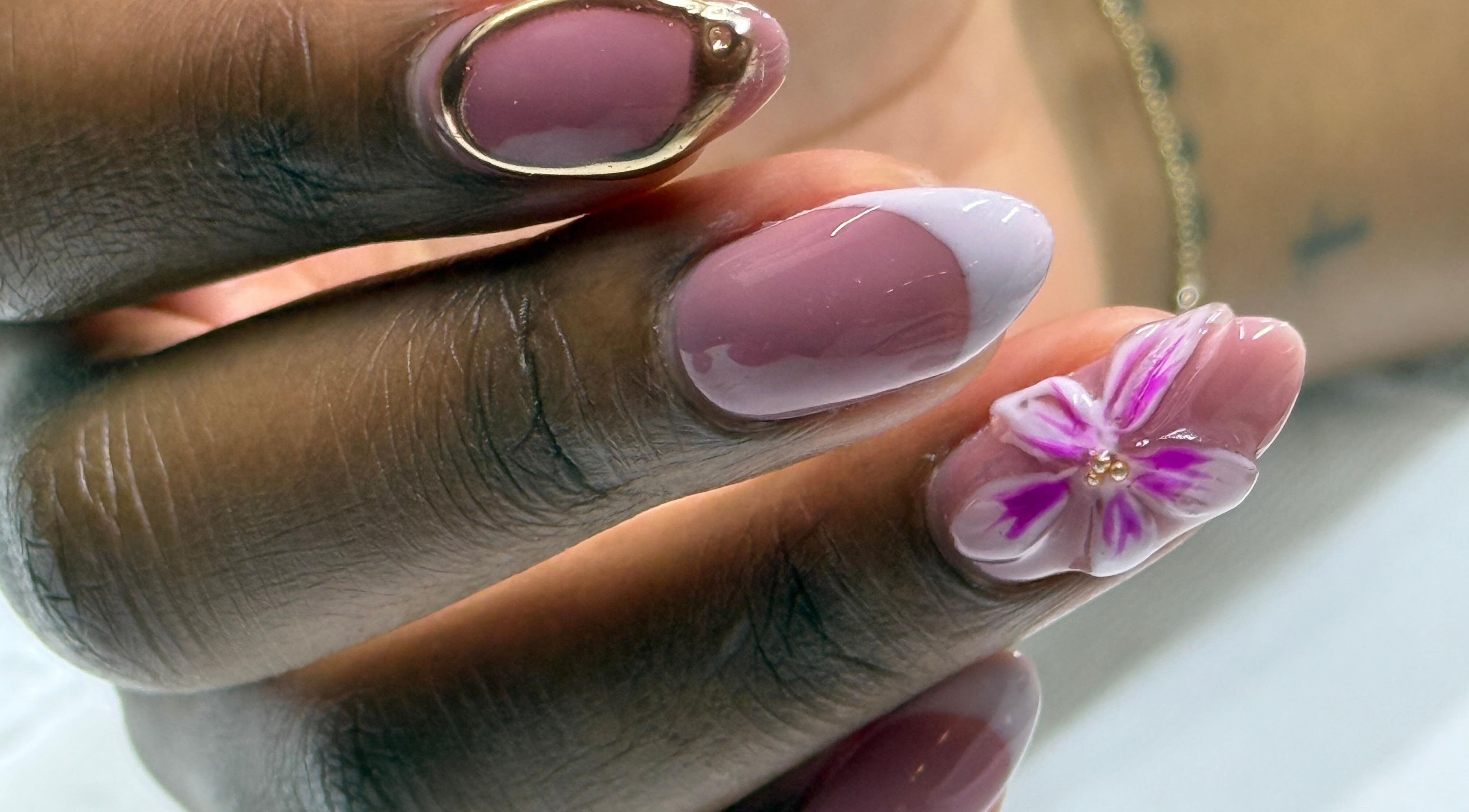 Elegant pink floral nail art at NOSI.BEAUTI in Johannesburg, Gauteng, ZA highlights creativity and style.