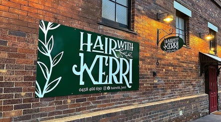 Hair With Kerri sign on rustic brick facade near Colestè Twilley Makeup, Crows Nest, Queensland, AU.