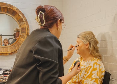 Makeup artist at Colestè Twilley Makeup, Crows Nest, Queensland, AU enhancing client's beauty with precision.