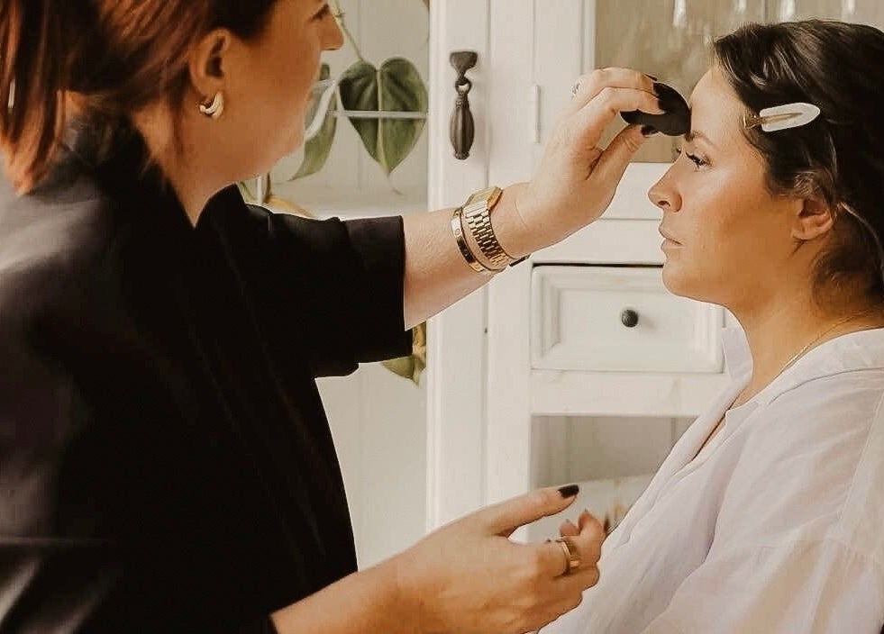 A makeup artist perfecting eye makeup at Colestè Twilley Makeup, Toowoomba Region, Queensland, AU.