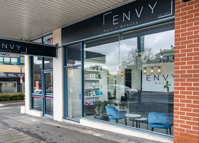 Exterior view of Envy Hair and Beauty in Five Dock, New South Wales, AU, showcasing modern front and sleek design.