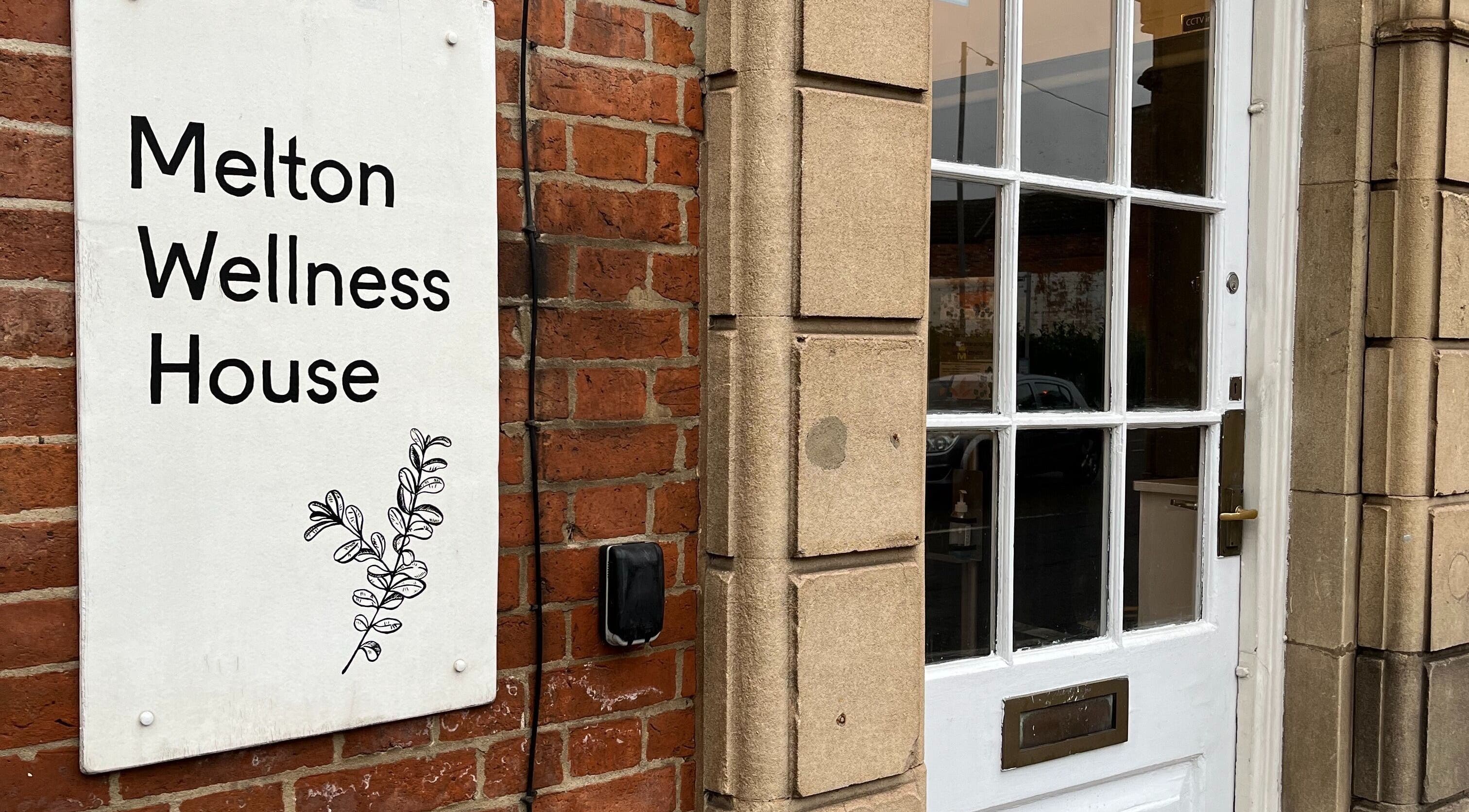 Front view of Melton Wellness House sign at Hummingbird Hideaway, Melton Mowbray, England, GB.
