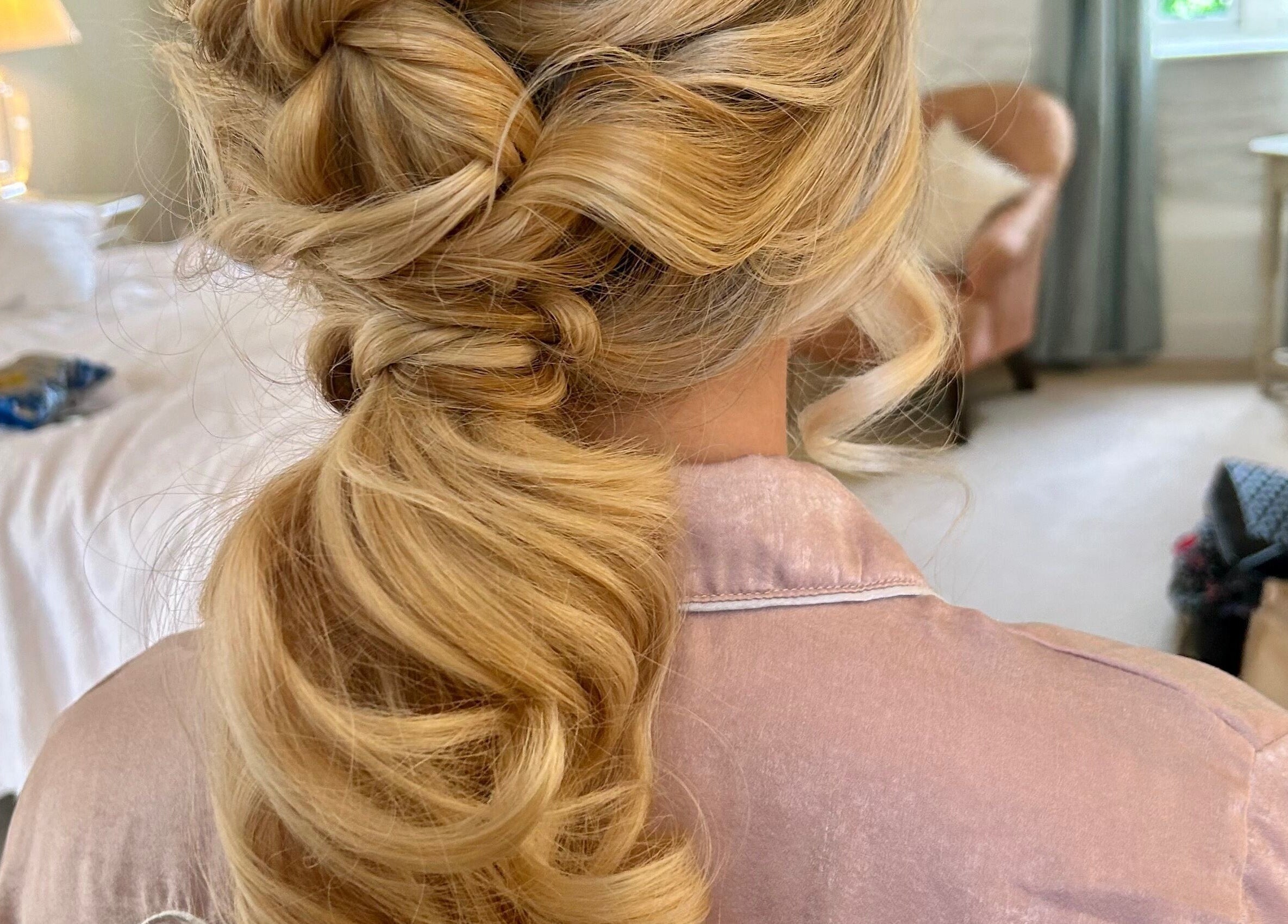 Elegant braided hairstyle at Navy in Halesworth, England, GB. Ideal for weddings or special events.