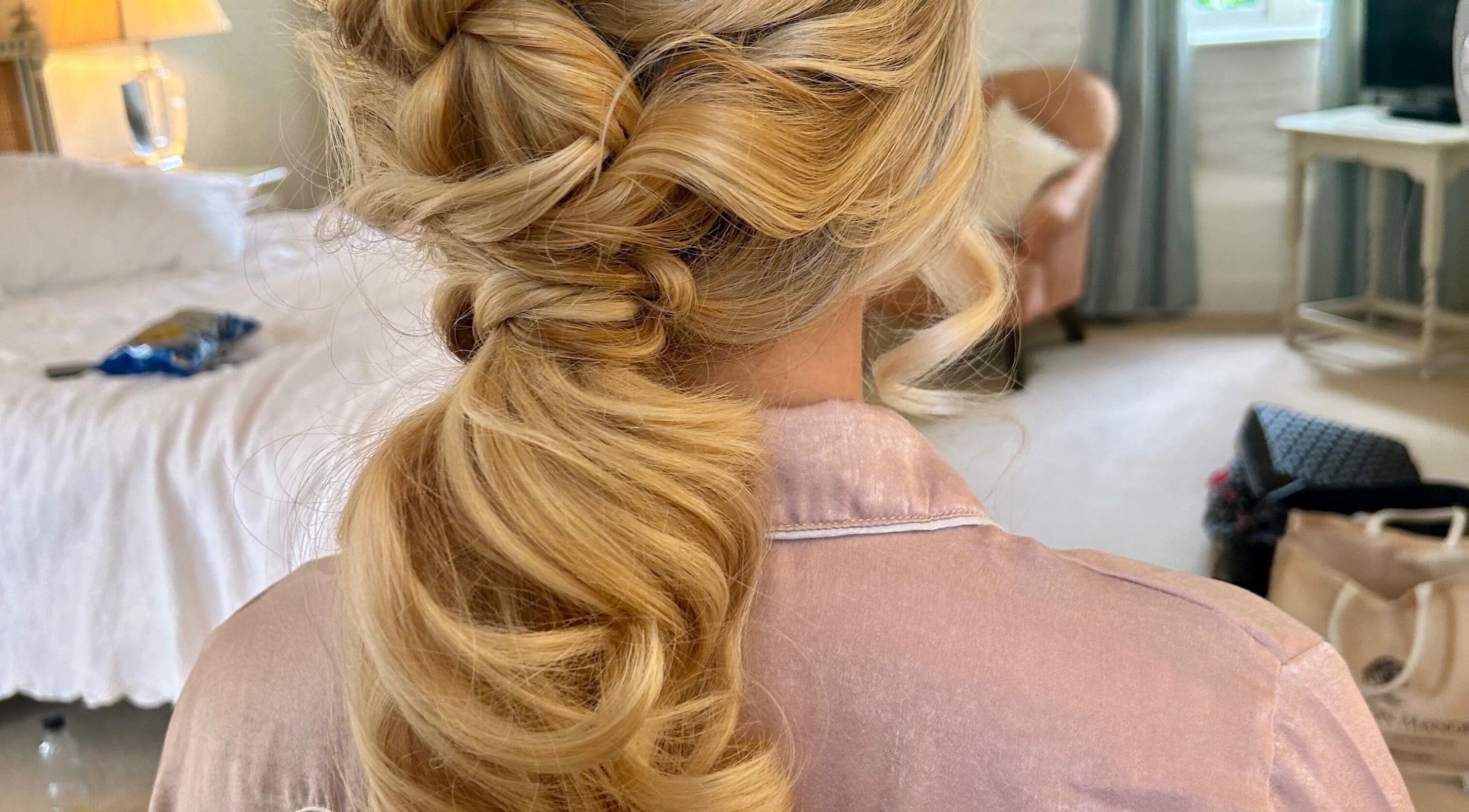 Elegant braided hairstyle at Navy in Halesworth, England, GB. Ideal for weddings or special events.