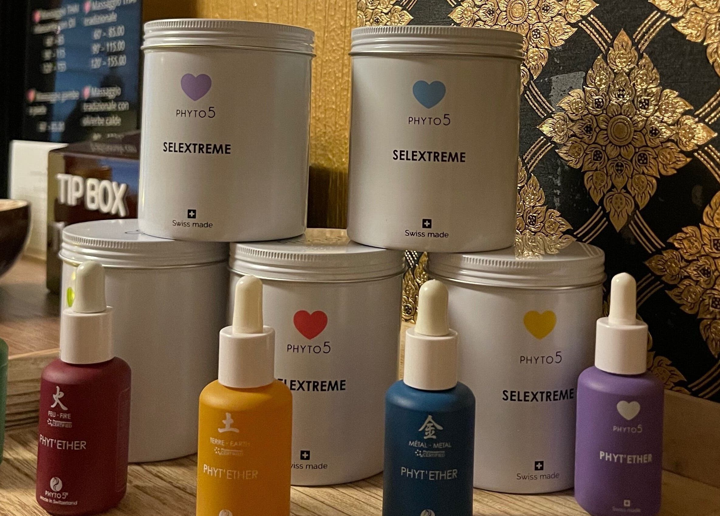 Phyto products at GrandRelax at ThaiMassage, Ascona, Ticino, CH on ornate wooden shelf.