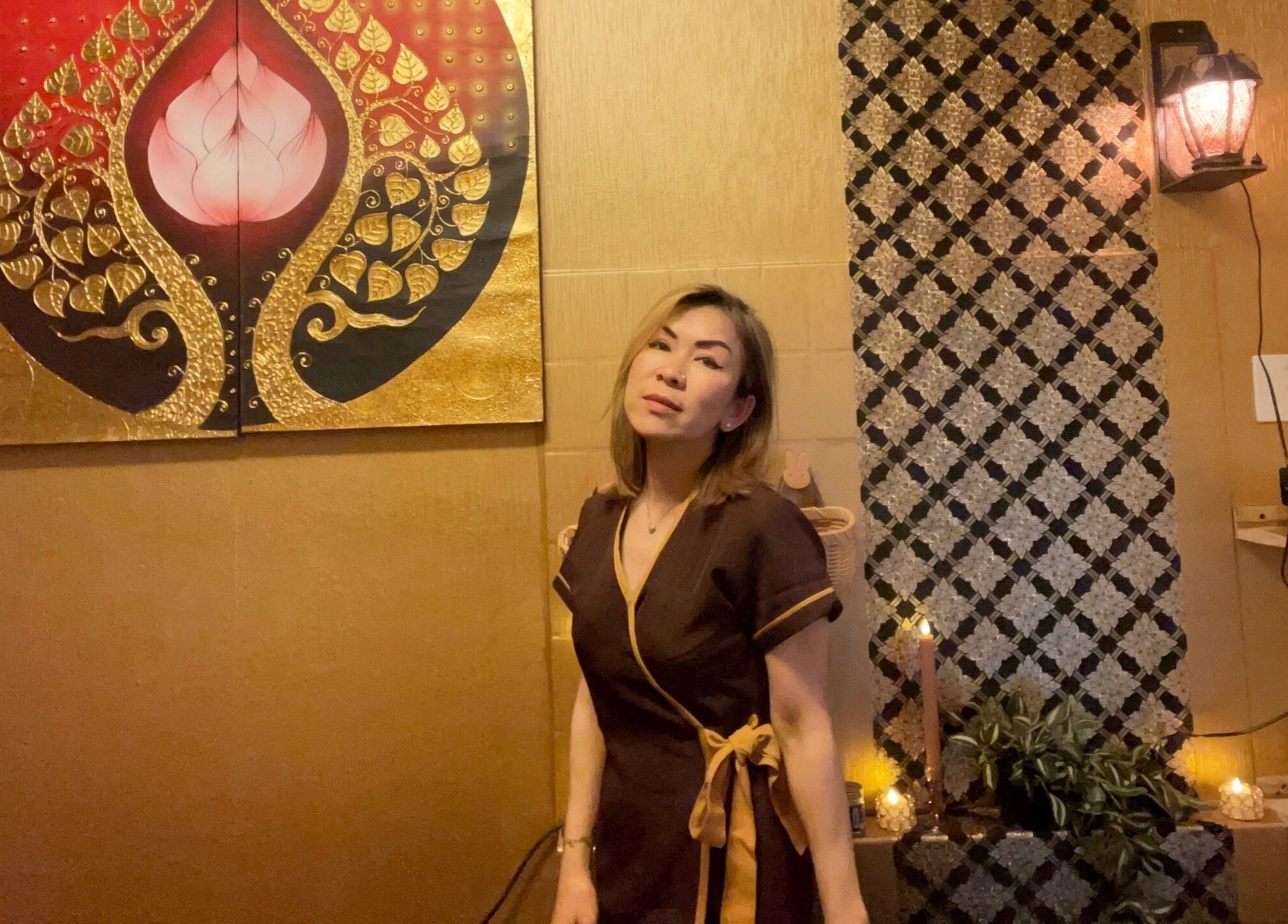 Relaxing interior at GrandRelax at ThaiMassage, Ascona, Ticino, CH, featuring intricate artwork and soothing ambiance.