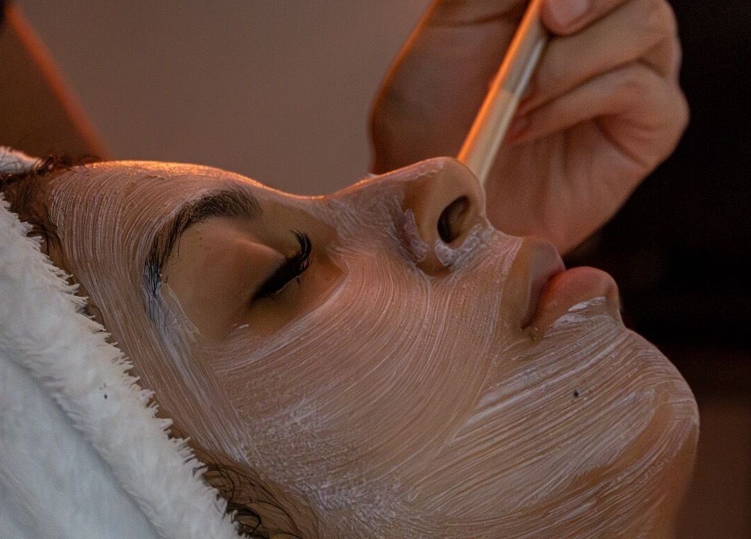 Relaxing facial treatment at Soluna Skin Studio, Durham, North Carolina, US, enhances skin glow and rejuvenation.