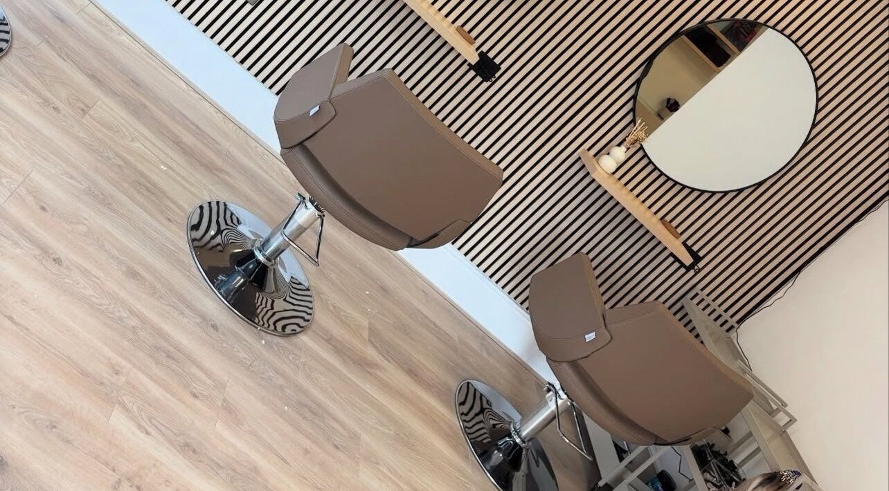 Modern salon chairs at Olivia Tyman Hair Design, Elland, England, GB, showcasing sleek design and elegance.