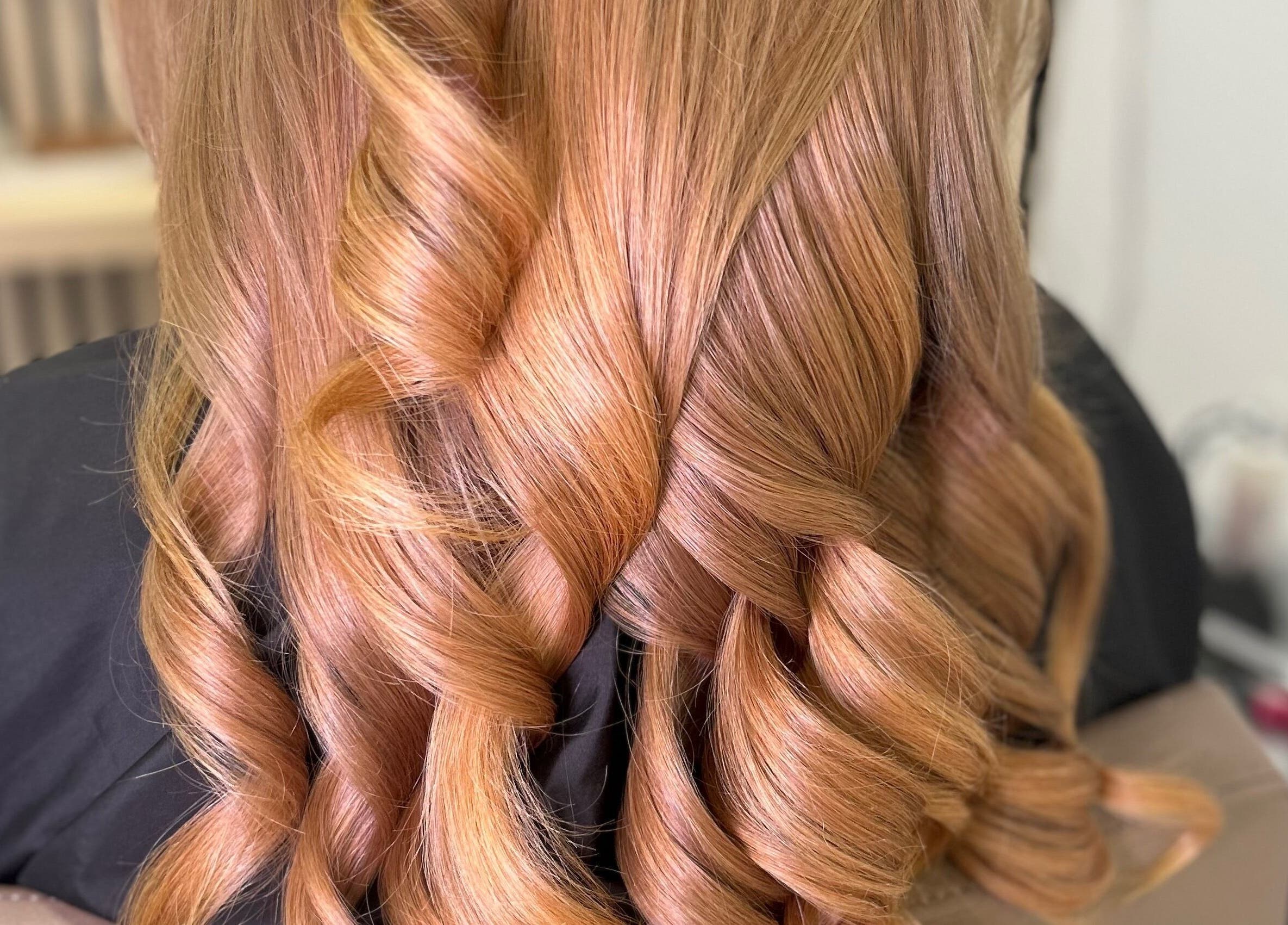 Stylish curls at Olivia Tyman Hair Design in Elland, England, GB showcasing expert craftsmanship.