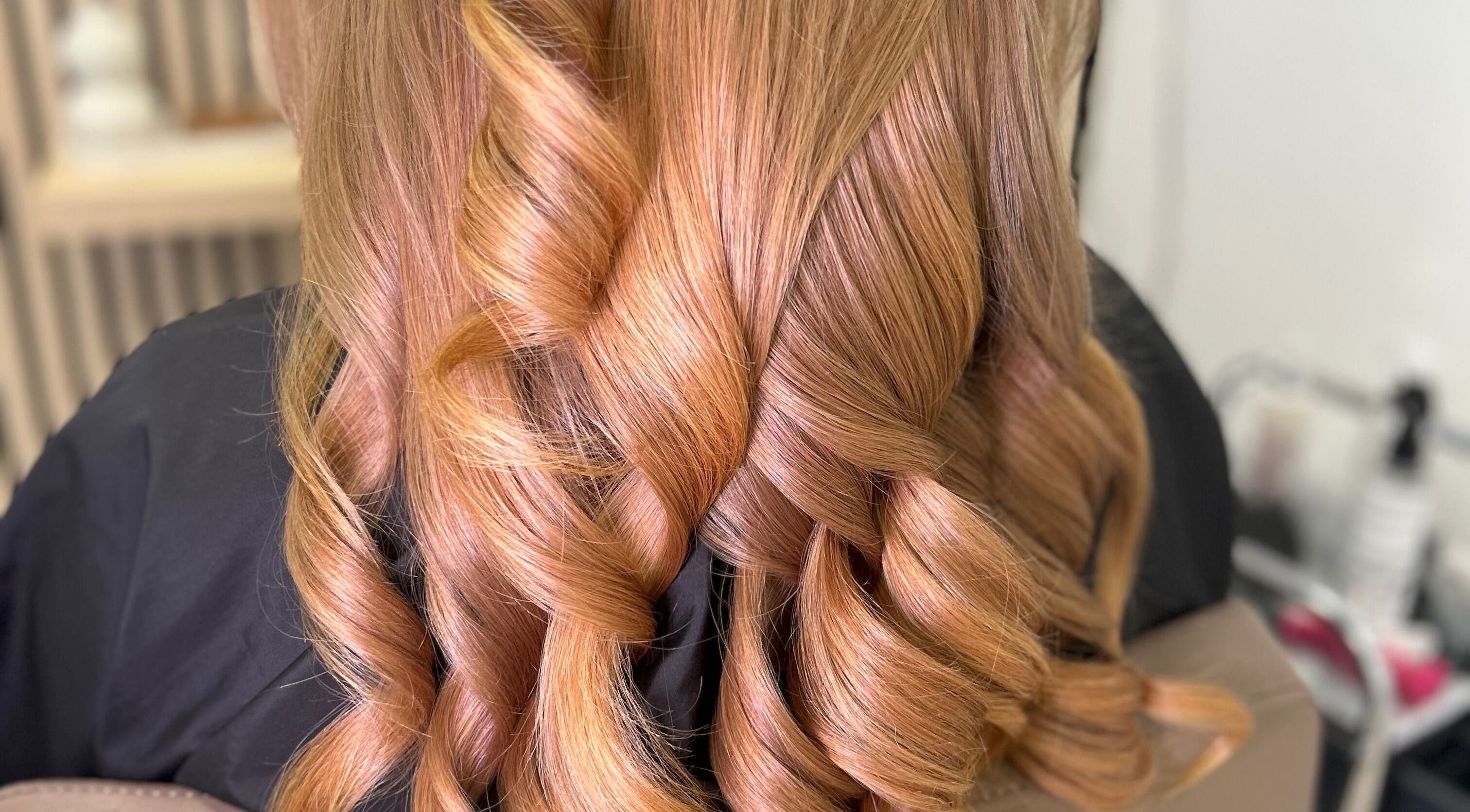 Stylish curls at Olivia Tyman Hair Design in Elland, England, GB showcasing expert craftsmanship.