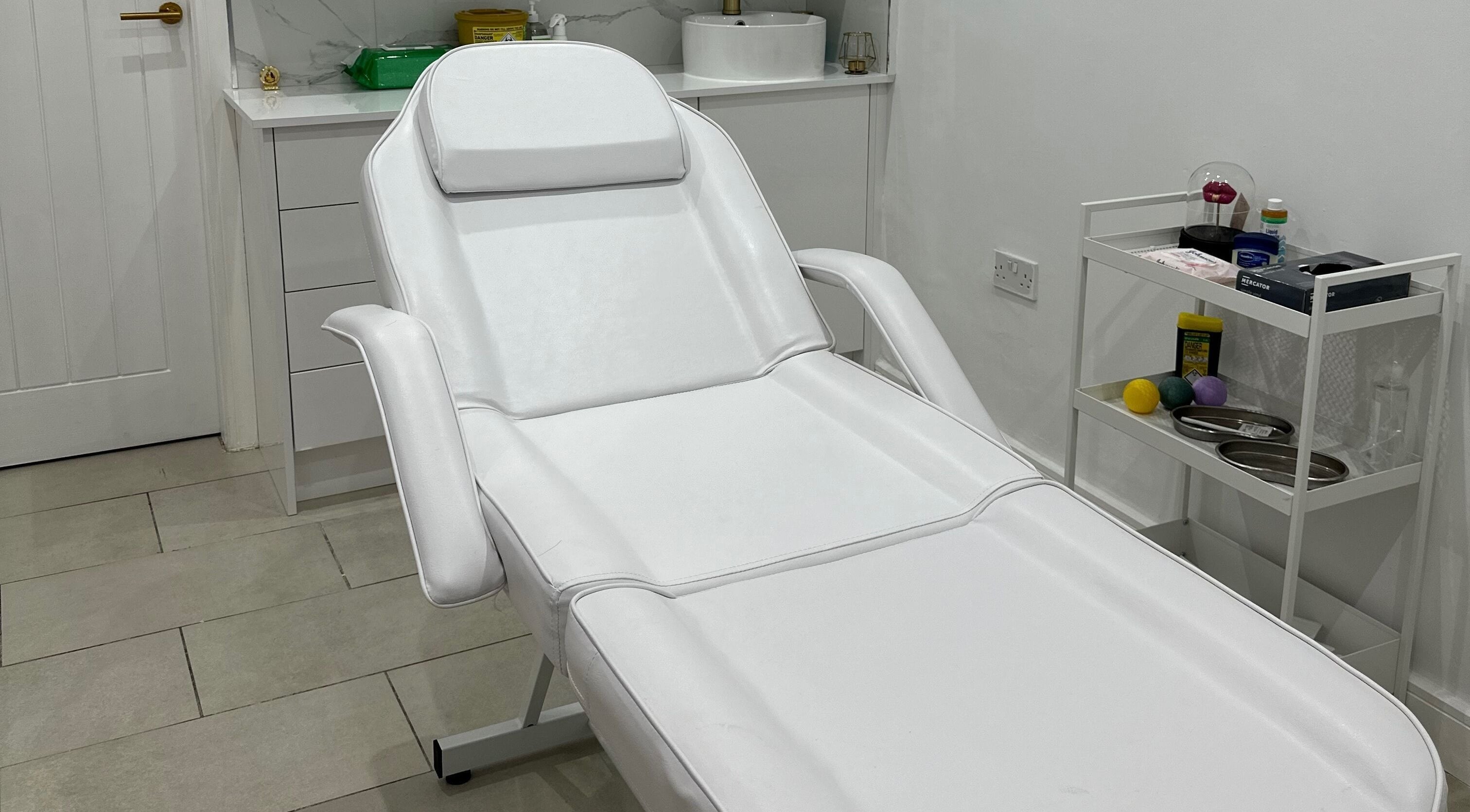 Comfortable treatment bed at Clear Touch Medical Aesthetics, Dudley, England, GB.