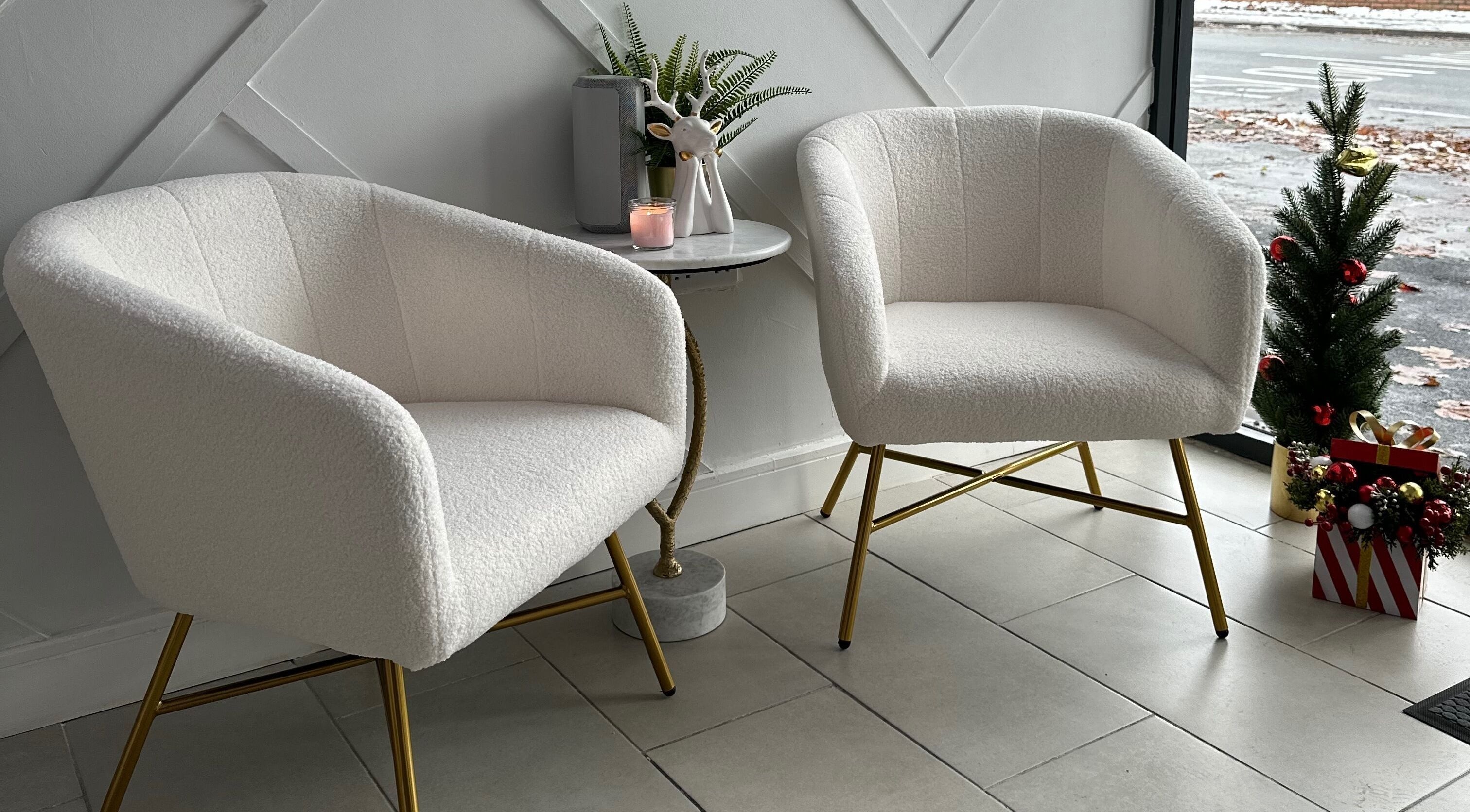 Inviting seating area at Clear Touch Medical Aesthetics, Dudley, England, GB with holiday decor.