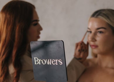 Makeup session at Browers, Dubbo, New South Wales, AU showcasing a professional beautician styling a client.
